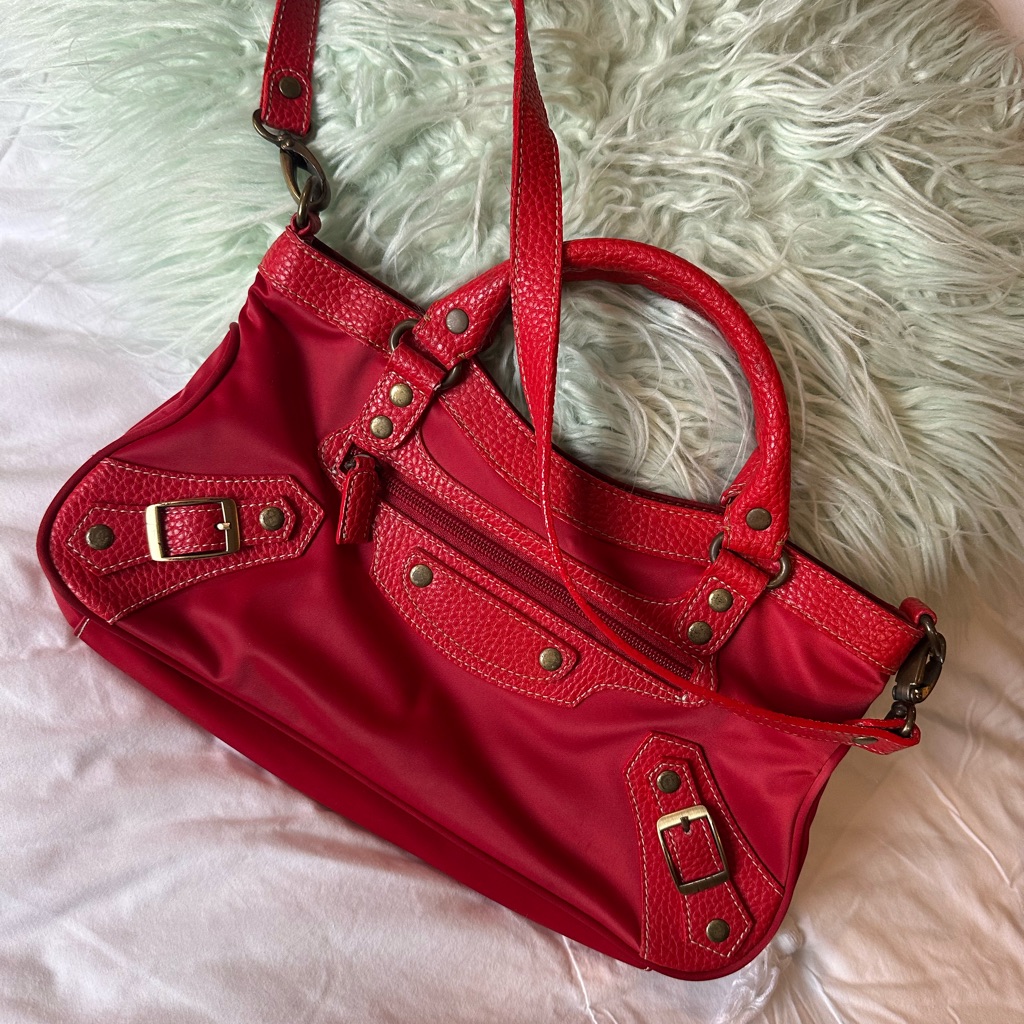 Vibrant Red Shoulder Bag With Adjustable Strap And Gold Hardware